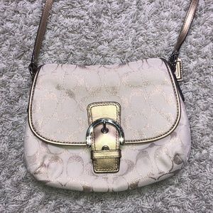 COACH gold cross body purse